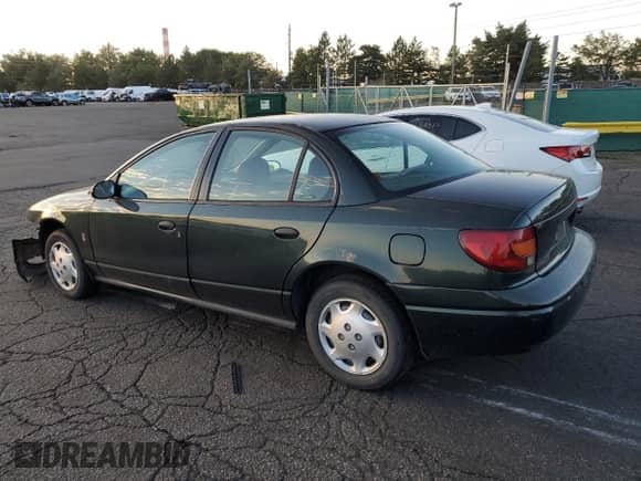 2002 Saturn SL with VIN 1G8ZG52842Z136529, listed as a Copart auction lot 69322825 with 215,279 mi miles and Salvage title. Bid and sale history available at DreamBid. Image 2.