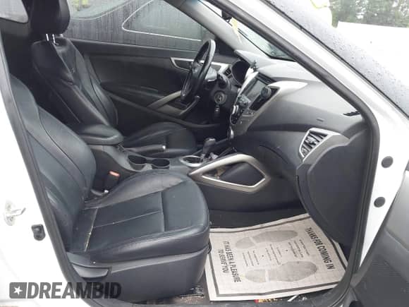 2015 Hyundai Veloster with VIN KMHTC6AD1FU222147, listed as a IAAI auction lot 42338622 with 158,231 mi miles and . Bid and sale history available at DreamBid. Image 5.