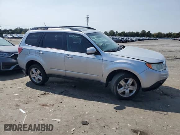 2009 Subaru Forester X with VIN JF2SH63629H727144, listed as a Copart auction lot 71531575 with 222,925 mi miles and Salvage title. Bid and sale history available at DreamBid. Image 4.