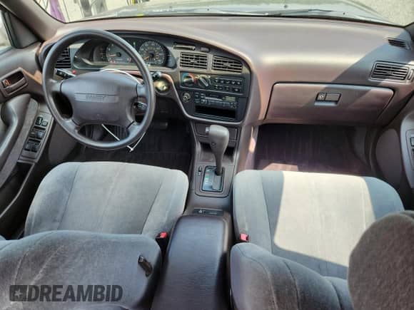 1993 Toyota Camry с VIN 4T1VK13E1PU075530, выставлен на аукционе Copart как лот 64218835 с пробегом 58 871 миль миль и Списание • Salvage title. История ставок и продаж доступна на DreamBid. Изображение 8.