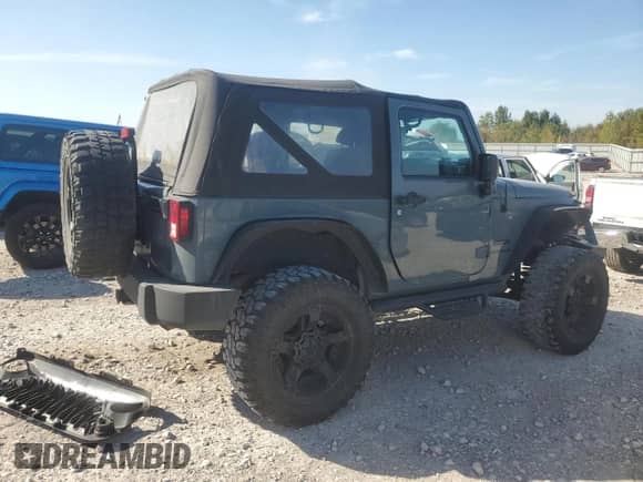 2014 Jeep Wrangler Sport with VIN 1C4AJWAG6EL181224, listed as a Copart auction lot 82060695 with 97,609 mi miles and Clean title. Bid and sale history available at DreamBid. Image 3.