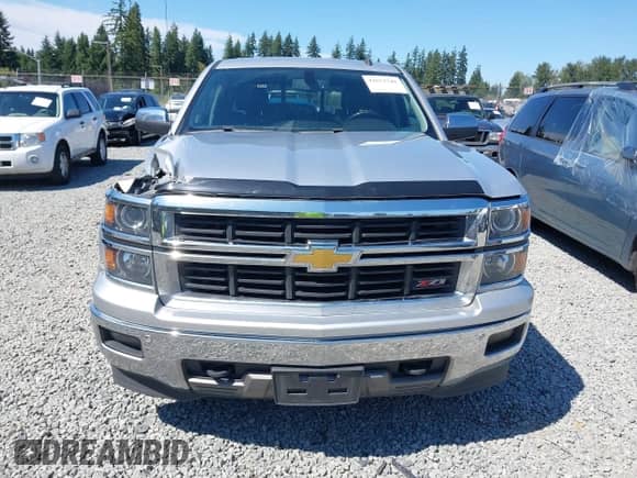 2014 Chevrolet Silverado 1500 LTZ with VIN 1GCUKSEC4EF197043, listed as a IAAI auction lot 42673341 with 131,445 mi miles and . Bid and sale history available at DreamBid. Image 12.