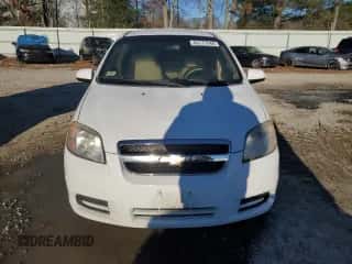 2011 Chevrolet Aveo 1LT z VIN KL1TD5DE8BB261878, wystawiony jako Copart lot #83177544 z przebiegiem 119 557 mil mil oraz Czysty tytuł • Clean title. Historia ofert i sprzedaży dostępna na DreamBid. Obrazek 5.