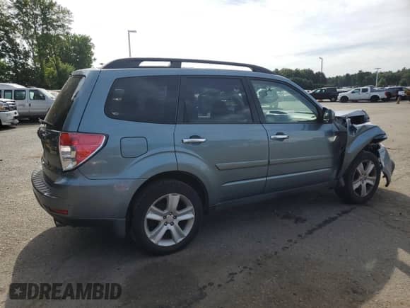 2011 Subaru Forester X Premium с VIN JF2SHADC4BH768601, выставлен на аукционе Copart как лот 70204455 с пробегом 215 801 миль миль и Списание • Salvage title. История ставок и продаж доступна на DreamBid. Изображение 3.