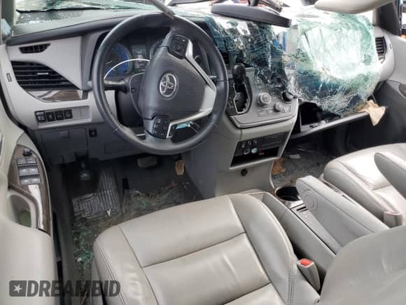 2016 Toyota Sienna XLE with VIN 5TDYK3DC9GS749096, listed as a Copart auction lot 66302075 with 145,442 mi miles and Salvage title. Bid and sale history available at DreamBid. Image 8.