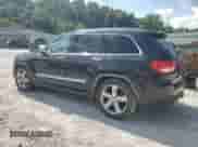 2011 Jeep Grand Cherokee Overland Summit with VIN 1J4RR6GT6BC576672, listed as a Copart auction lot 68143155 with 152,077 mi miles and Salvage title. Bid and sale history available at DreamBid. Image 2.