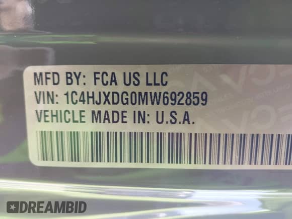 2021 Jeep Wrangler Unlimited 80th Anniversary with VIN 1C4HJXDG0MW692859, listed as a IAAI auction lot 43138758 with 58,354 mi miles and . Bid and sale history available at DreamBid. Image 9.