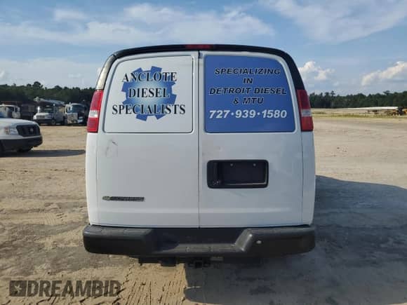 2020 Chevrolet Express Cargo with VIN 1GCWGAFG8L1276232, listed as a Copart auction lot 70943995 with 97,579 mi miles and Salvage title. Bid and sale history available at DreamBid. Image 6.