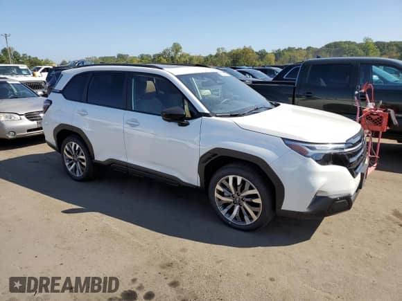 2025 Subaru Forester Touring z VIN JF2SLDTC3SH540154, wystawiony jako Copart lot #80704595 z przebiegiem 5 456 mil mil oraz Szkoda całkowita • Salvage title. Historia ofert i sprzedaży dostępna na DreamBid. Obrazek 4.