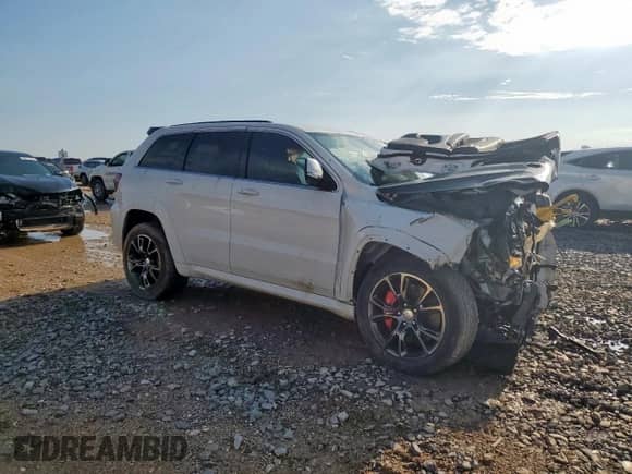 2015 Jeep Grand Cherokee SRT with VIN 1C4RJFDJ8FC797020, listed as a Copart auction lot 69139355 with Not provided miles and Non repairable. Bid and sale history available at DreamBid. Image 4.