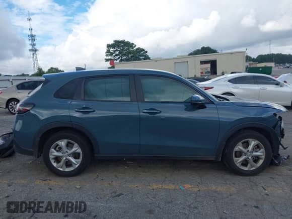 2025 Honda HR-V LX with VIN 3CZRZ1H36SM711648, listed as a IAAI auction lot 42970785 with 19,437 mi miles and . Bid and sale history available at DreamBid. Image 13.