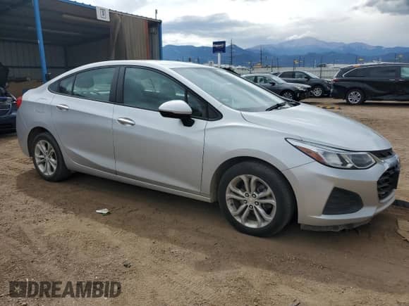 2019 Chevrolet Cruze LS с VIN 1G1BC5SM8K7137302, выставлен на аукционе Copart как лот 80582455 с пробегом 111 322 миль миль и Списание • Salvage title. История ставок и продаж доступна на DreamBid. Изображение 4.