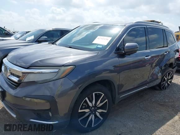 2019 Honda Pilot Touring 8-Passenger z VIN 5FNYF5H93KB010964, wystawiony jako IAAI lot #42743156 z przebiegiem 270 017 mil mil oraz . Historia ofert i sprzedaży dostępna na DreamBid. Obrazek 16.