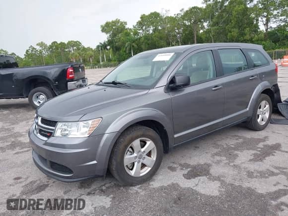 2013 Dodge Journey SE with VIN 3C4PDCAB6DT529949, listed as a IAAI auction lot 42609006 with 38,202 mi miles and . Bid and sale history available at DreamBid. Image 18.