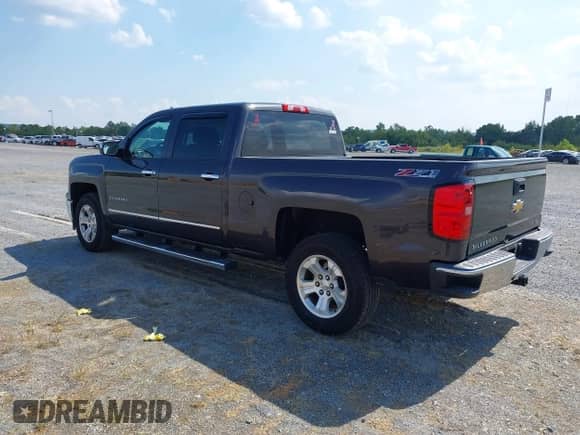 2014 Chevrolet Silverado 1500 LTZ z VIN 3GCUKSEC5EG345313, wystawiony jako IAAI lot #43244013 z przebiegiem 135 131 mil mil oraz . Historia ofert i sprzedaży dostępna na DreamBid. Obrazek 3.