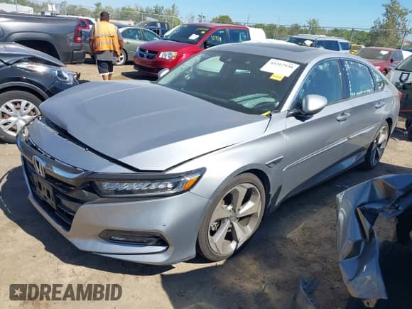 2018 Honda Accord Touring с VIN 1HGCV1F98JA152003, выставлен на аукционе IAAI как лот 43317938 с пробегом 107 087 миль миль и . История ставок и продаж доступна на DreamBid. Изображение 2.
