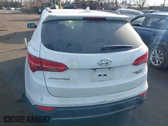 2016 Hyundai Santa Fe with VIN 5XYZWDLA4GG332545, listed as a IAAI auction lot 41478859 with 185,584 mi miles and . Bid and sale history available at DreamBid. Image 16.