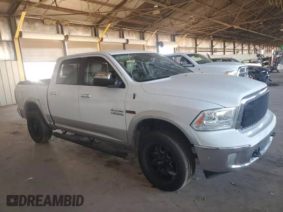 2014 Ram 1500 Laramie with VIN 1C6RR7NM3ES417696, listed as a Copart auction lot 84220885 with 169,739 mi miles and Clean title. Bid and sale history available at DreamBid. Image 4.