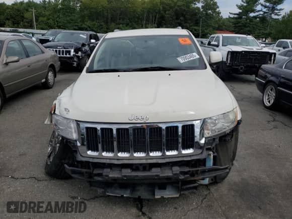 2011 Jeep Grand Cherokee Laredo with VIN 1J4RR4GG1BC576179, listed as a Copart auction lot 70903405 with Not provided miles and Salvage title. Bid and sale history available at DreamBid. Image 5.