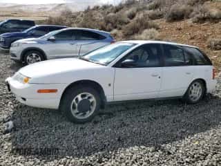 2000 Saturn SW z VIN 1G8ZJ8279YZ118174, wystawiony jako Copart lot #48820105 z przebiegiem 205 882 mil mil oraz Szkoda całkowita • Salvage title. Historia ofert i sprzedaży dostępna na DreamBid. Obrazek 1.