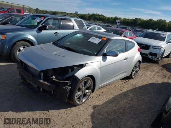 2013 Hyundai Veloster w/Black Int z VIN KMHTC6AD1DU096921, wystawiony jako IAAI lot #43332519 z przebiegiem 30 553 mil mil oraz . Historia ofert i sprzedaży dostępna na DreamBid. Obrazek 17.