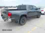 2023 Toyota Tacoma SR5 z VIN 3TMAZ5CN0PM200298, wystawiony jako IAAI lot #42880608 z przebiegiem 73 069 mil mil oraz . Historia ofert i sprzedaży dostępna na DreamBid. Obrazek 4.