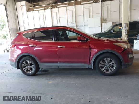 2015 Hyundai Santa Fe with VIN 5XYZU3LB9FG258465, listed as a IAAI auction lot 42708301 with 76,204 mi miles and . Bid and sale history available at DreamBid. Image 12.