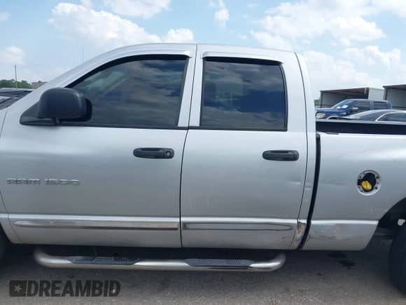 2004 Dodge 1500 SLT with VIN 1D7HA18D44S581645, listed as a IAAI auction lot 42453219 with 203,691 mi miles and . Bid and sale history available at DreamBid. Image 14.