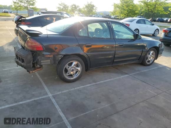 2004 Pontiac Grand Am GT с VIN 1G2NW52E24M637369, выставлен на аукционе Copart как лот 55379165 с пробегом 211 637 миль миль и Списание • Salvage title. История ставок и продаж доступна на DreamBid. Изображение 3.