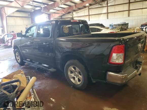 2024 Ram 1500 Big Horn with VIN 1C6RRFFG7RN141675, listed as a Copart auction lot 65241645 with 24,636 mi miles and Salvage title. Bid and sale history available at DreamBid. Image 2.