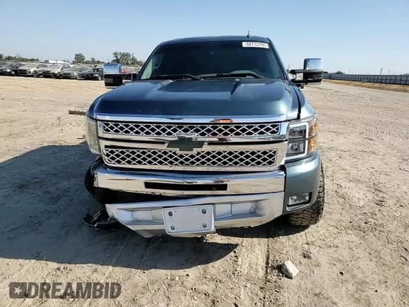 2012 Chevrolet Silverado 1500 LS z VIN 3GCPCREA1CG224955, wystawiony jako Copart lot #68713195 z przebiegiem 105 680 mil mil oraz Szkoda całkowita • Salvage title. Historia ofert i sprzedaży dostępna na DreamBid. Obrazek 13.