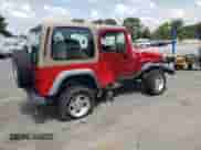 2000 Jeep Wrangler Sport z VIN 1J4FA49S6YP783339, wystawiony jako Copart lot #68548335 z przebiegiem 45 484 mil mil oraz Szkoda całkowita • Salvage title. Historia ofert i sprzedaży dostępna na DreamBid. Obrazek 3.
