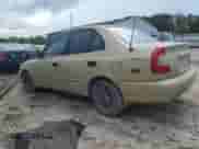 2002 Hyundai Accent GL z VIN KMHCG45C02U296132, wystawiony jako Copart lot #59401835 z przebiegiem 115 421 mil mil oraz Czysty tytuł • Clean title. Historia ofert i sprzedaży dostępna na DreamBid. Obrazek 2.