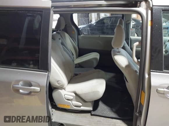 2012 Toyota Sienna LE AAS with VIN 5TDKK3DC1CS253502, listed as a IAAI auction lot 43380424 with 157,876 mi miles and . Bid and sale history available at DreamBid. Image 8.