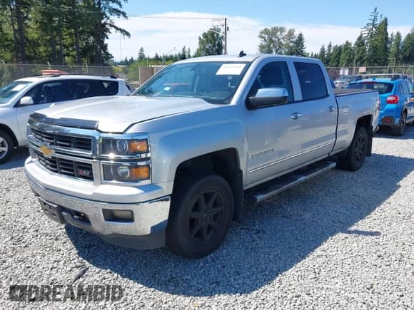 2014 Chevrolet Silverado 1500 LTZ with VIN 1GCUKSEC4EF197043, listed as a IAAI auction lot 42673341 with 131,445 mi miles and . Bid and sale history available at DreamBid. Image 17.