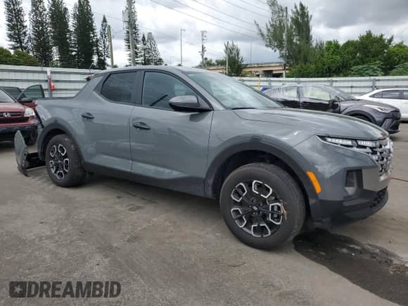 2024 Hyundai Santa Cruz SE с VIN 5NTJADAE2RH080860, выставлен на аукционе Copart как лот 86791885 с пробегом 12 505 миль миль и Списание • Salvage title. История ставок и продаж доступна на DreamBid. Изображение 4.