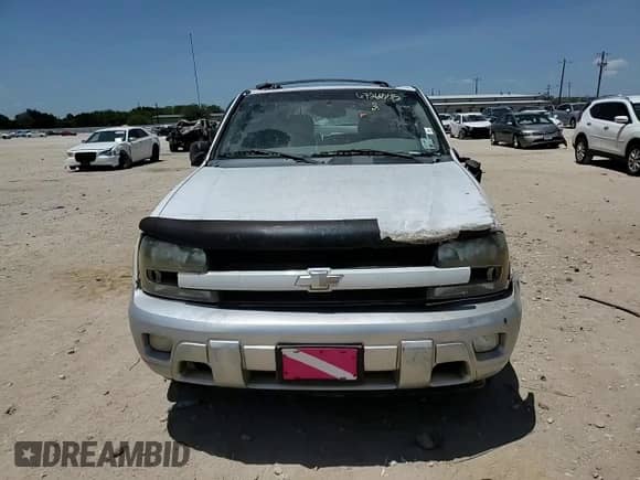 2005 Chevrolet TrailBlazer LT с VIN 1GNDS13S052340475, выставлен на аукционе Copart как лот 67266245 с пробегом Не указан миль и Списание • Salvage title. История ставок и продаж доступна на DreamBid. Изображение 13.
