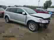 2014 Dodge Journey SXT with VIN 3C4PDDBGXET175760, listed as a Copart auction lot 69418575 with 163,051 mi miles and Salvage title. Bid and sale history available at DreamBid. Image 4.
