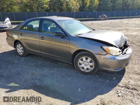 2002 Toyota Camry LE with VIN 4T1BE32K62U621647, listed as a Copart auction lot 82364885 with 97,346 mi miles and Salvage title. Bid and sale history available at DreamBid. Image 4.