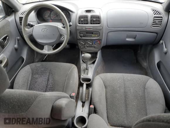 2000 Hyundai Accent with VIN KMHCG45G8YU120795, listed as a Copart auction lot 61005175 with 96,515 mi miles and Clean title. Bid and sale history available at DreamBid. Image 8.