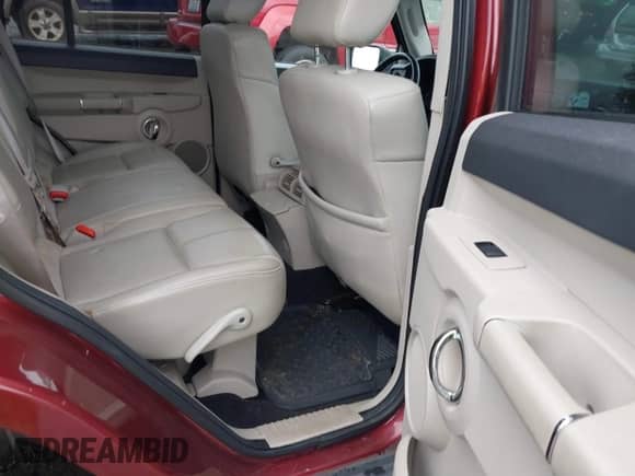 2007 Jeep Commander Limited with VIN 1J8HG58P77C573878, listed as a IAAI auction lot 41843633 with 154,584 mi miles and . Bid and sale history available at DreamBid. Image 8.