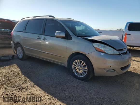 2010 Toyota Sienna XLE с VIN 5TDYK4CC1AS312935, выставлен на аукционе Copart как лот 84916835 с пробегом 147 715 миль миль и Списание • Salvage title. История ставок и продаж доступна на DreamBid. Изображение 4.