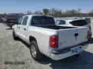2007 Dodge Dakota SLT с VIN 1D7HE48P77S164721, выставлен на аукционе Copart как лот 49673685 с пробегом 218 861 миль миль и Списание • Salvage title. История ставок и продаж доступна на DreamBid. Изображение 2.