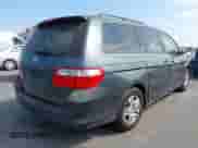 2006 Honda Odyssey EX z VIN 5FNRL38416B436826, wystawiony jako IAAI lot #43254317 z przebiegiem 162 845 mil mil oraz . Historia ofert i sprzedaży dostępna na DreamBid. Obrazek 4.