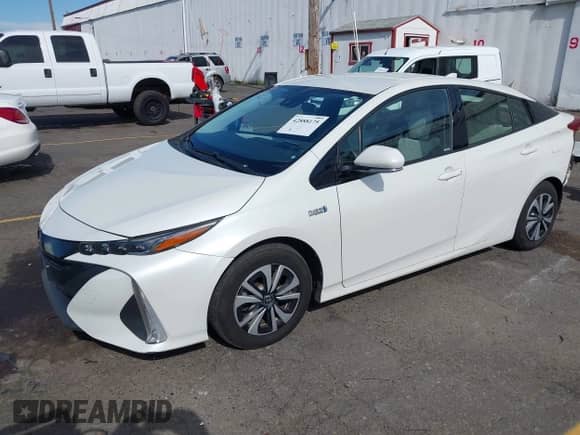 2018 Toyota Prius Plus z VIN JTDKARFP5J3077090, wystawiony jako IAAI lot #42888175 z przebiegiem 192 157 mil mil oraz . Historia ofert i sprzedaży dostępna na DreamBid. Obrazek 2.