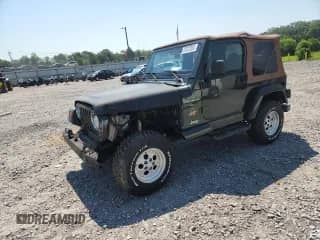 1997 Jeep Wrangler Sahara с VIN 1J4FY49S3VP519387, выставлен на аукционе Copart как лот 63822395 с пробегом 187 884 миль миль и Списание • Salvage title. История ставок и продаж доступна на DreamBid. Изображение 1.
