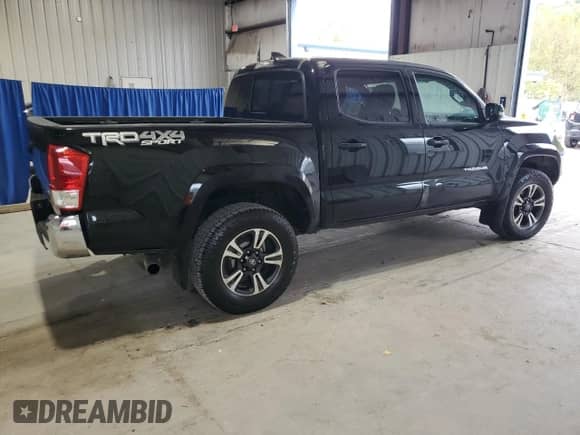 2017 Toyota Tacoma SR5 with VIN 5TFCZ5AN1HX052069, listed as a Copart auction lot 85709515 with 165,409 mi miles and Clean title. Bid and sale history available at DreamBid. Image 3.