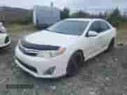 2012 Toyota Camry XLE with VIN 4T1BK1FK7CU514664, listed as a Copart auction lot 71484725 with 335,770 mi miles and Clean title. Bid and sale history available at DreamBid. Image 1.