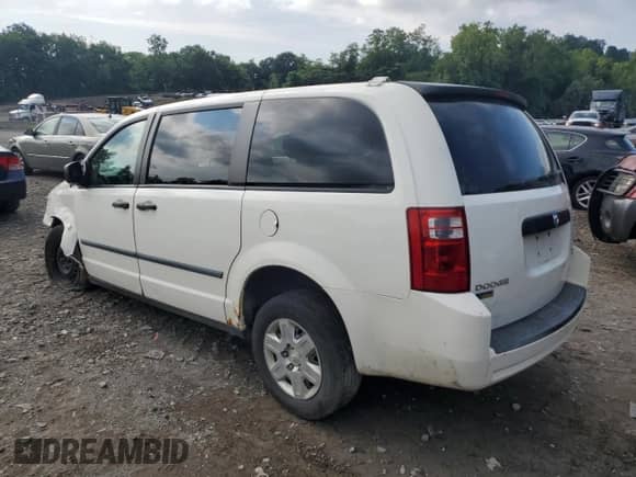 2010 Dodge Grand Caravan Cargo with VIN 2D4RN1AE3AR119468, listed as a Copart auction lot 66057014 with 86,801 mi miles and Salvage title. Bid and sale history available at DreamBid. Image 2.