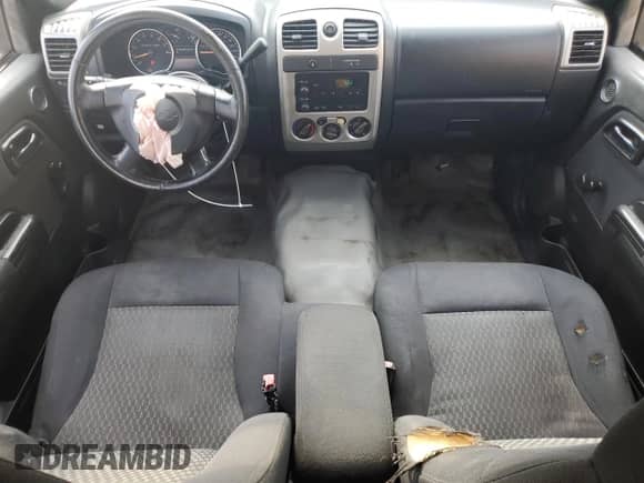 2009 Chevrolet Colorado Work Truck with VIN 1GCCS199098138389, listed as a Copart auction lot 64021555 with 204,628 mi miles and Salvage title. Bid and sale history available at DreamBid. Image 8.